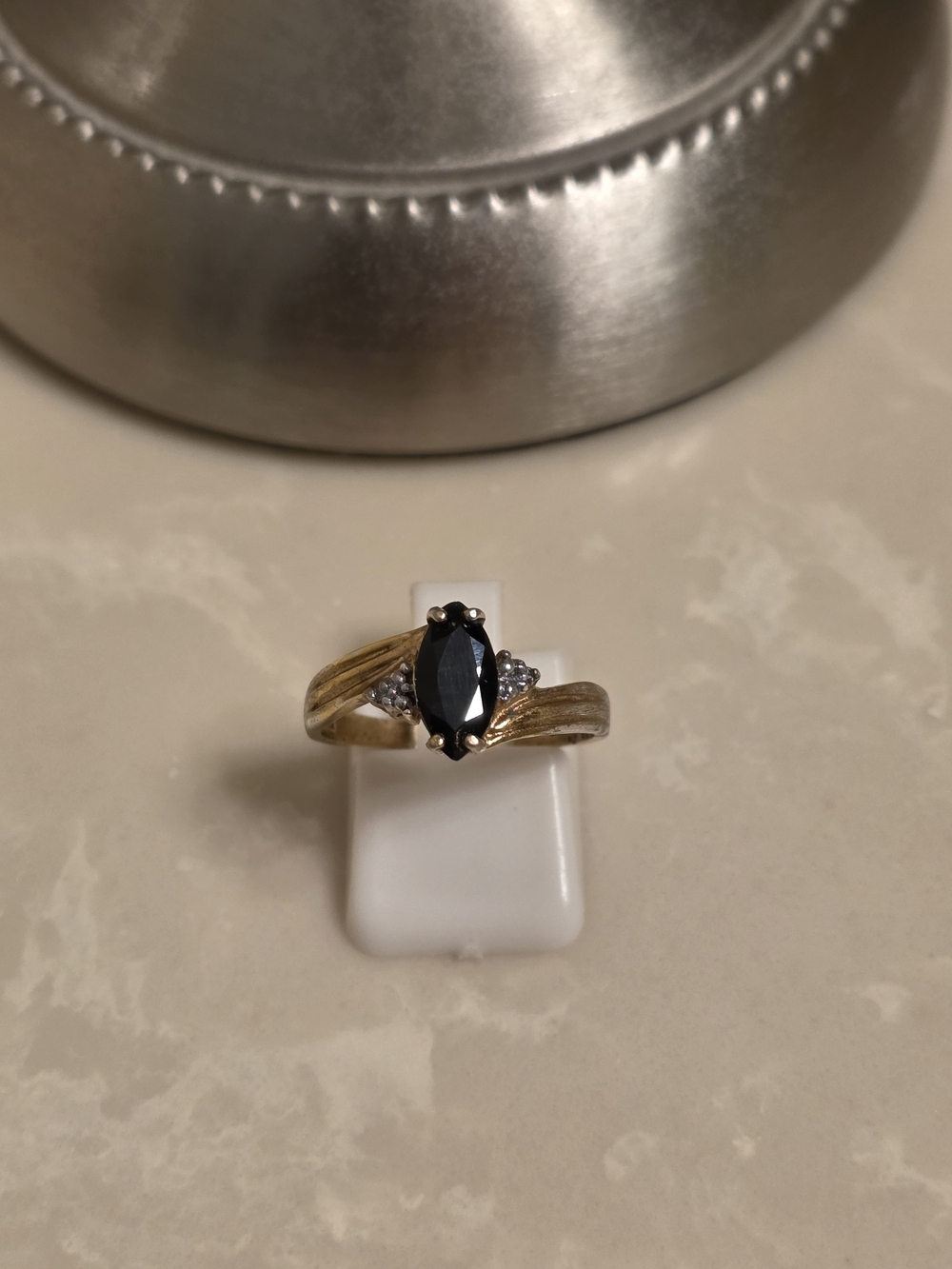 Gold Ring with Black Marquise Stone and Accent Diamonds